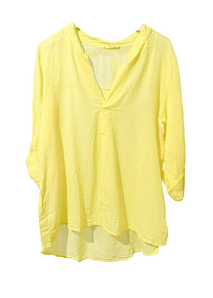 Yellow shirt with a V-neck and long sleeves on a white background