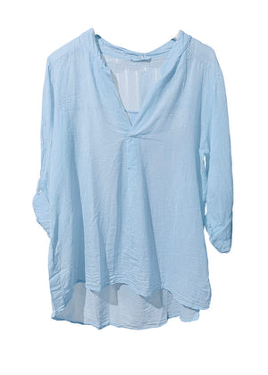 Light blue blouse on a white background