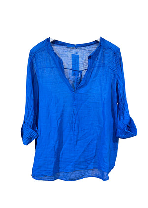 A blue shirt on a white background 