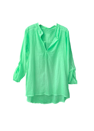 A medium spring green shirt on a white background 
