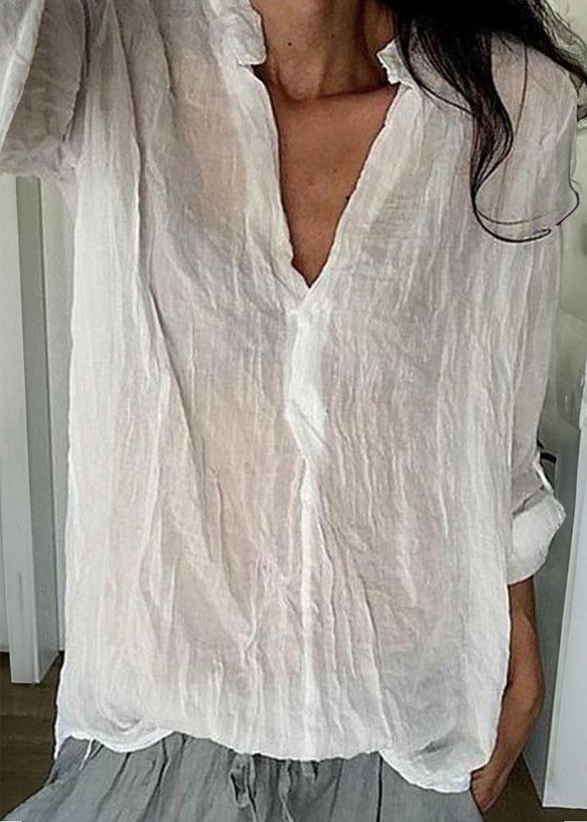 A person wearing a white shirt 
