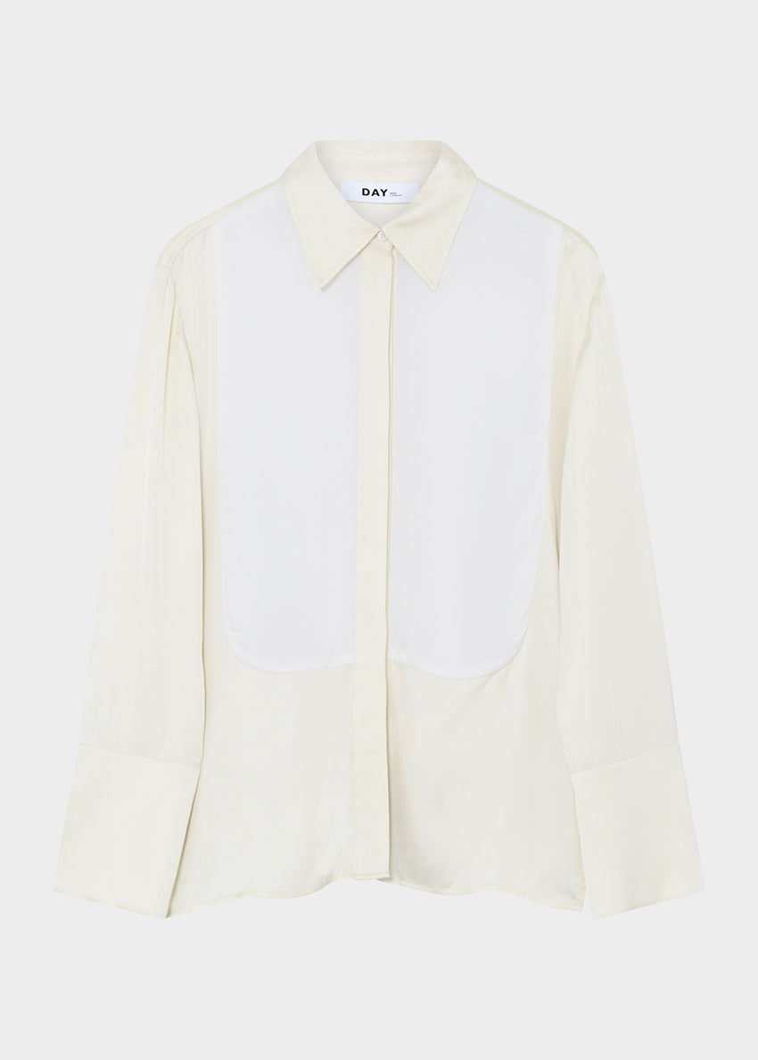 Light-colored shirt with a collar on a white background