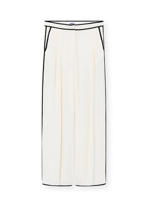 White pants with black trim on a white background