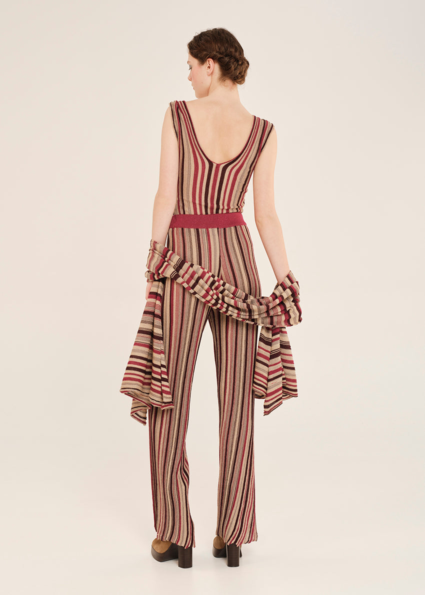 Knit red top crafted from shimmering lurex viscose yarn. Featuring a deep V-neckline, it’s designed with a signature tricolor stripe pattern. Matching pants and cardigan