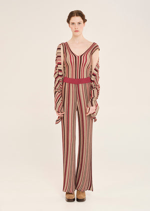 Knit red top crafted from shimmering lurex viscose yarn. Featuring a deep V-neckline, it’s designed with a signature tricolor stripe pattern. Matching pants and cardigan