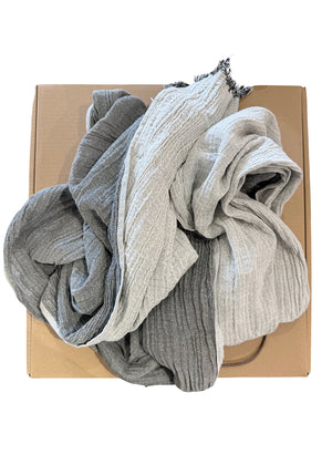 Box of gray and white socks on a white background
