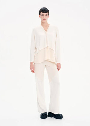 High waisted trousers made of a combination of two different fabrics in a straight line that feature an elastic waist