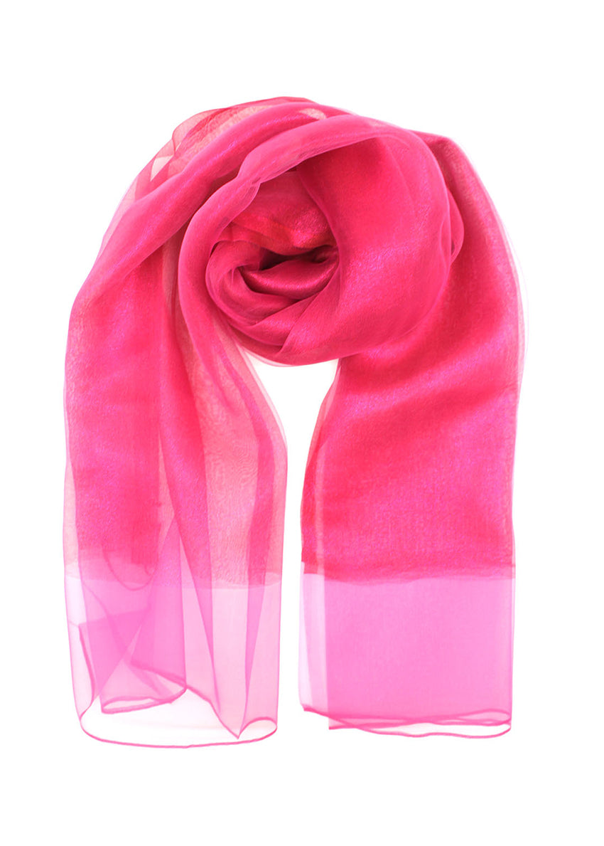 This elegant hot pink scarf features vibrant colors and a delicate sheer finish. The lightweight, airy fabric drapes beautifully, making it a versatile accessory for both casual and formal occasions.