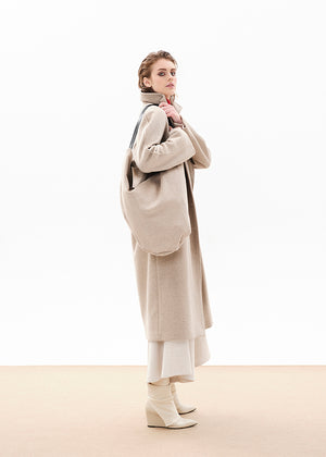 Oversized, slouchy, double bag made of wool blend fabric.