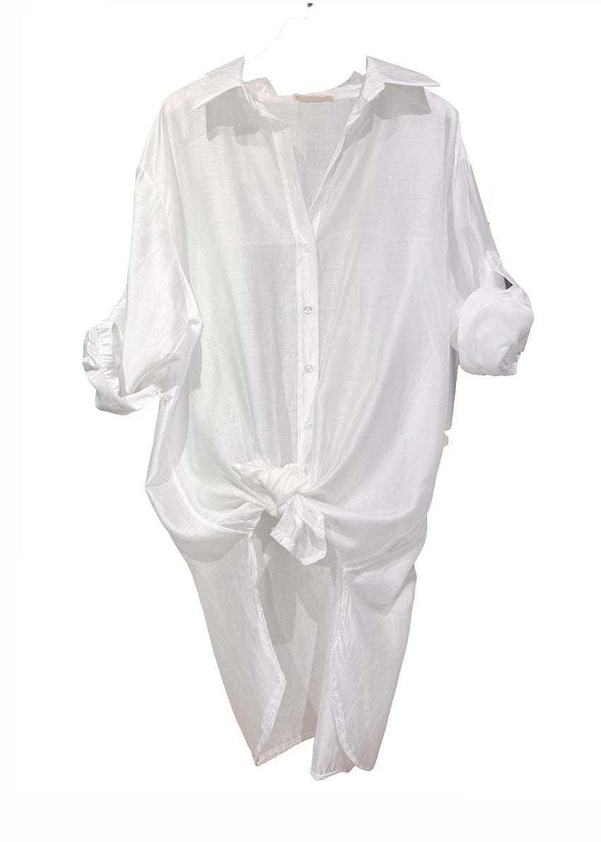 White shirt with rolled-up sleeves on a white background