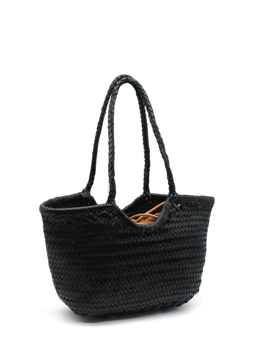 Black woven handbag on a white background