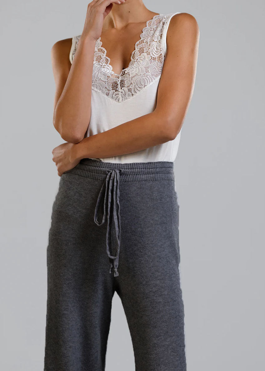Long wide grey pants made of a soft viscose blend, they feature elastic drawstring, perfect for resort lifestyle, travel comfort and fireplace parties