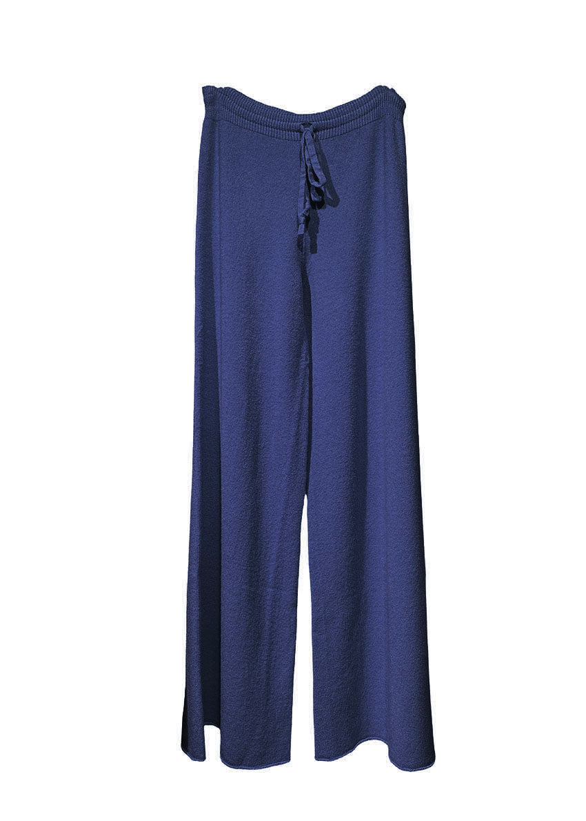 Long wide blue pants made of a soft viscose blend, they feature elastic drawstring, perfect for resort lifestyle, travel comfort and fireplace parties