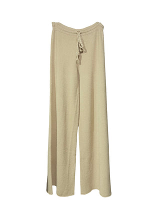 Long wide wheat pants made of a soft viscose blend, they feature elastic drawstring, perfect for resort lifestyle, travel comfort and fireplace parties