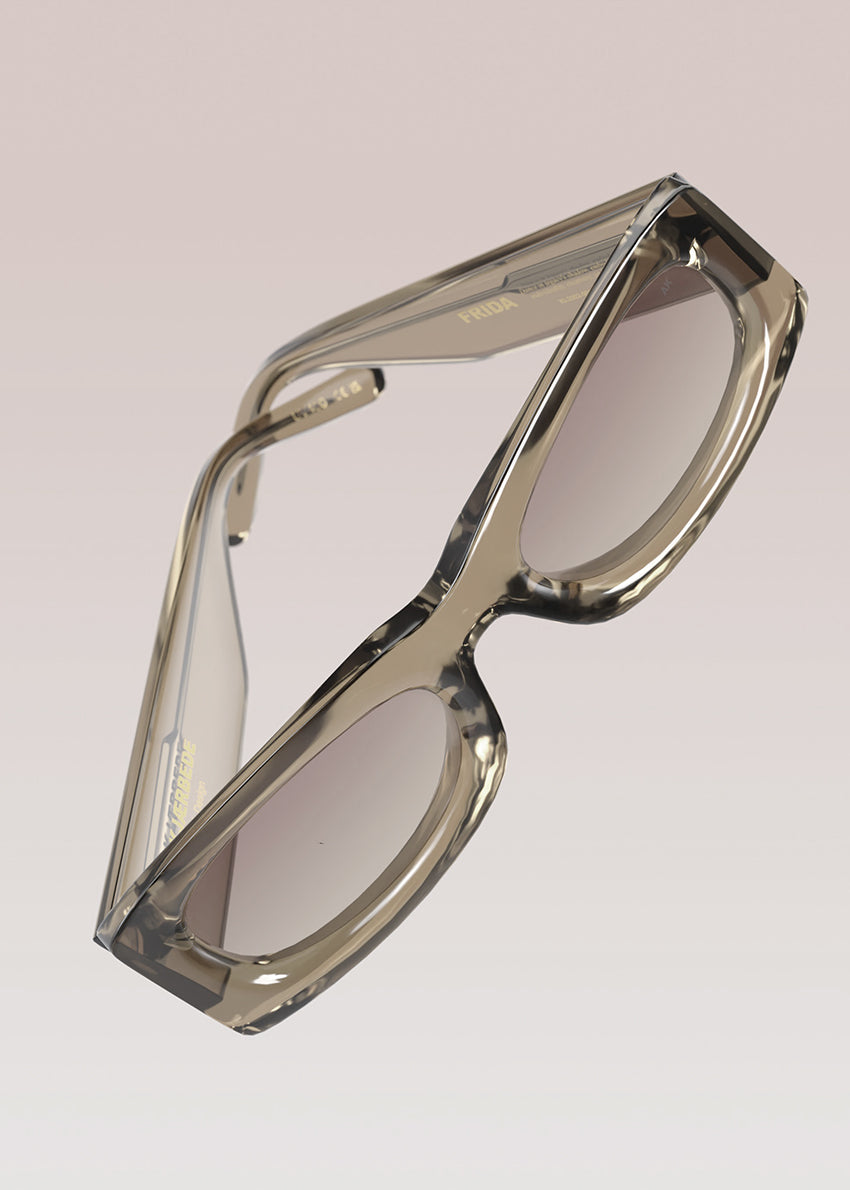 Clear frame eyeglasses on a light gray background