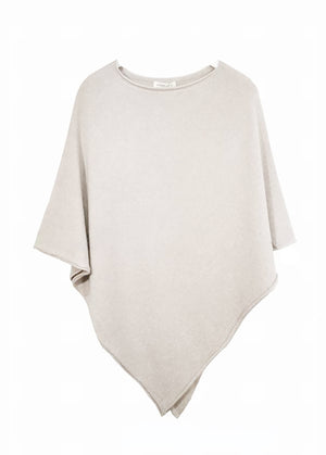 A beige poncho on a white background 