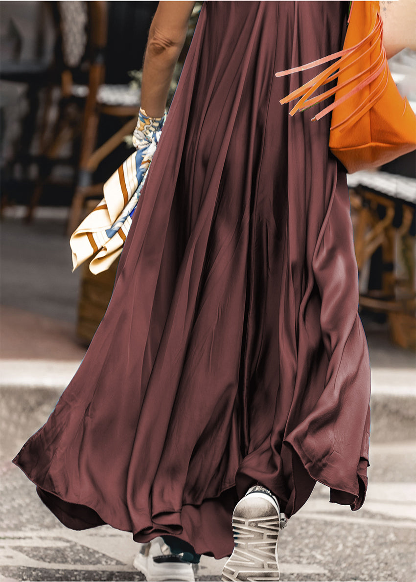 Woman wearing a brown silk dress