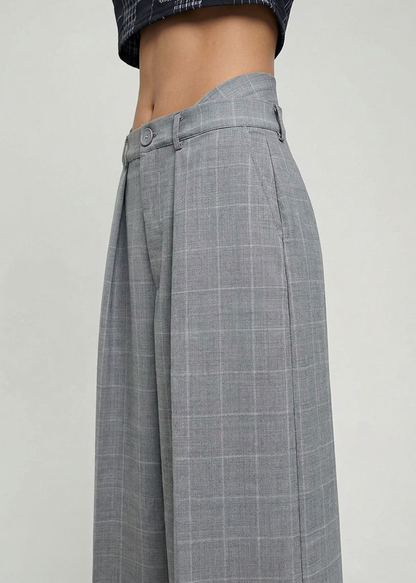 Gray checkered skirt on a plain background