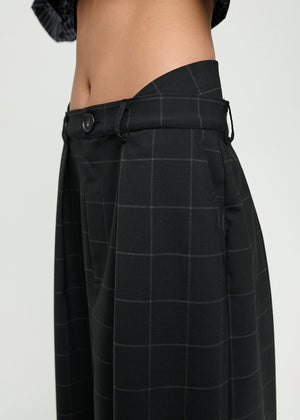 Black checkered skirt on a plain background