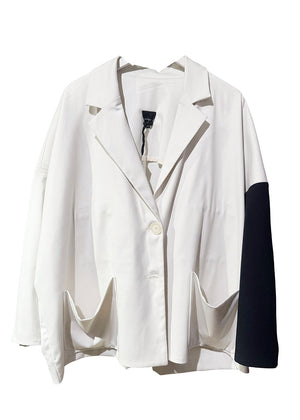 Grab this Flat White Jacket, a short-medium style, perfect for a chill and carefree look. Relaxed and slightly A-line, with a lapel collar, this jacket is crafted from a blend of cool poly-wool-like viscose fabric. Long sleeves in black and white, plank pockets, and hidden interior details make it a unique piece. Secure it with its button frontal closer.