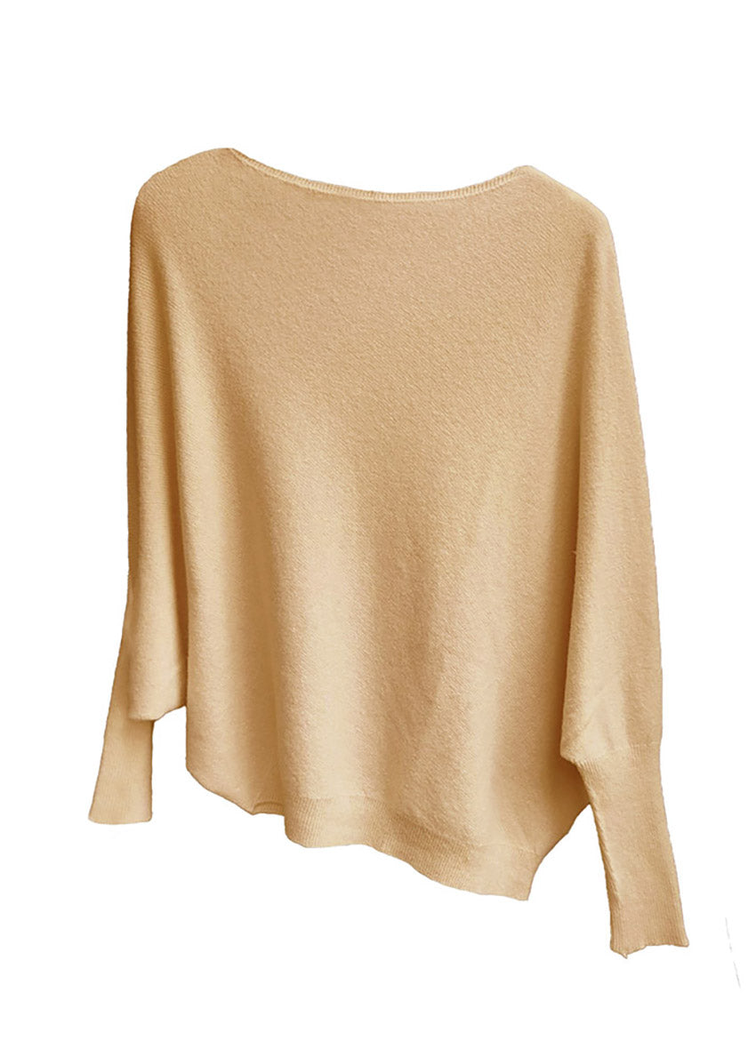 A brown, asymmetrical hemline sweater with fitted sleeves that flare out into a poncho-like shape