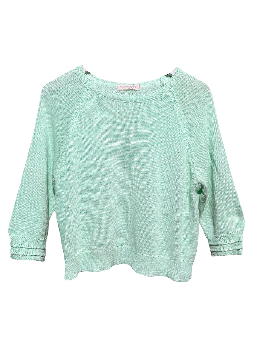 A turquoise sweater with 3/4 sleeves and a round large neckline, displayed against a white background.