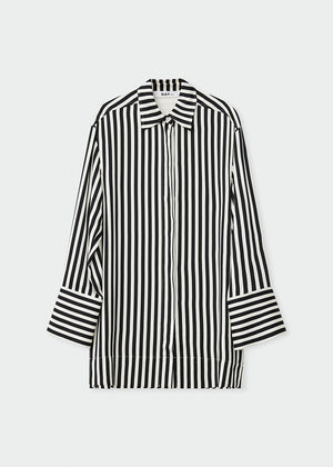 Black and white striped shirt on a light gray background
