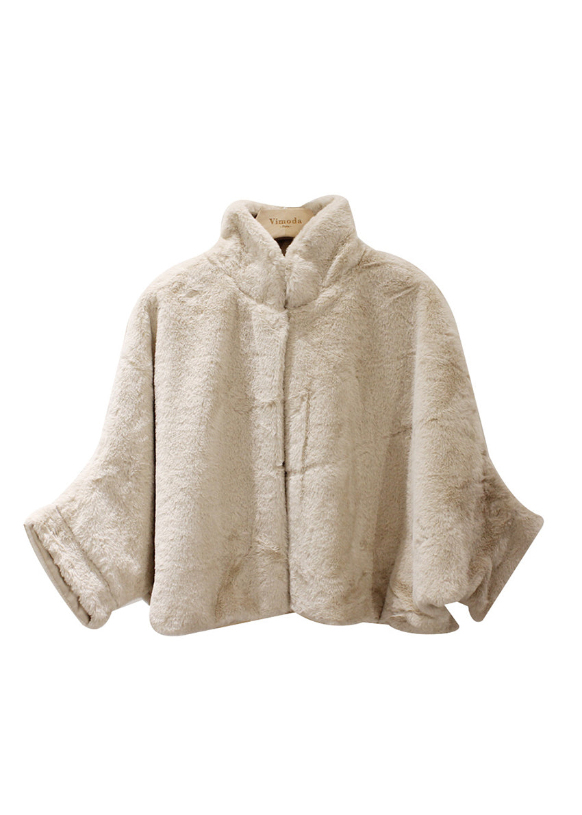 Beige cape on a white background