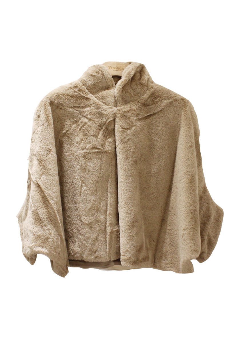 Tan fleece poncho on a white background