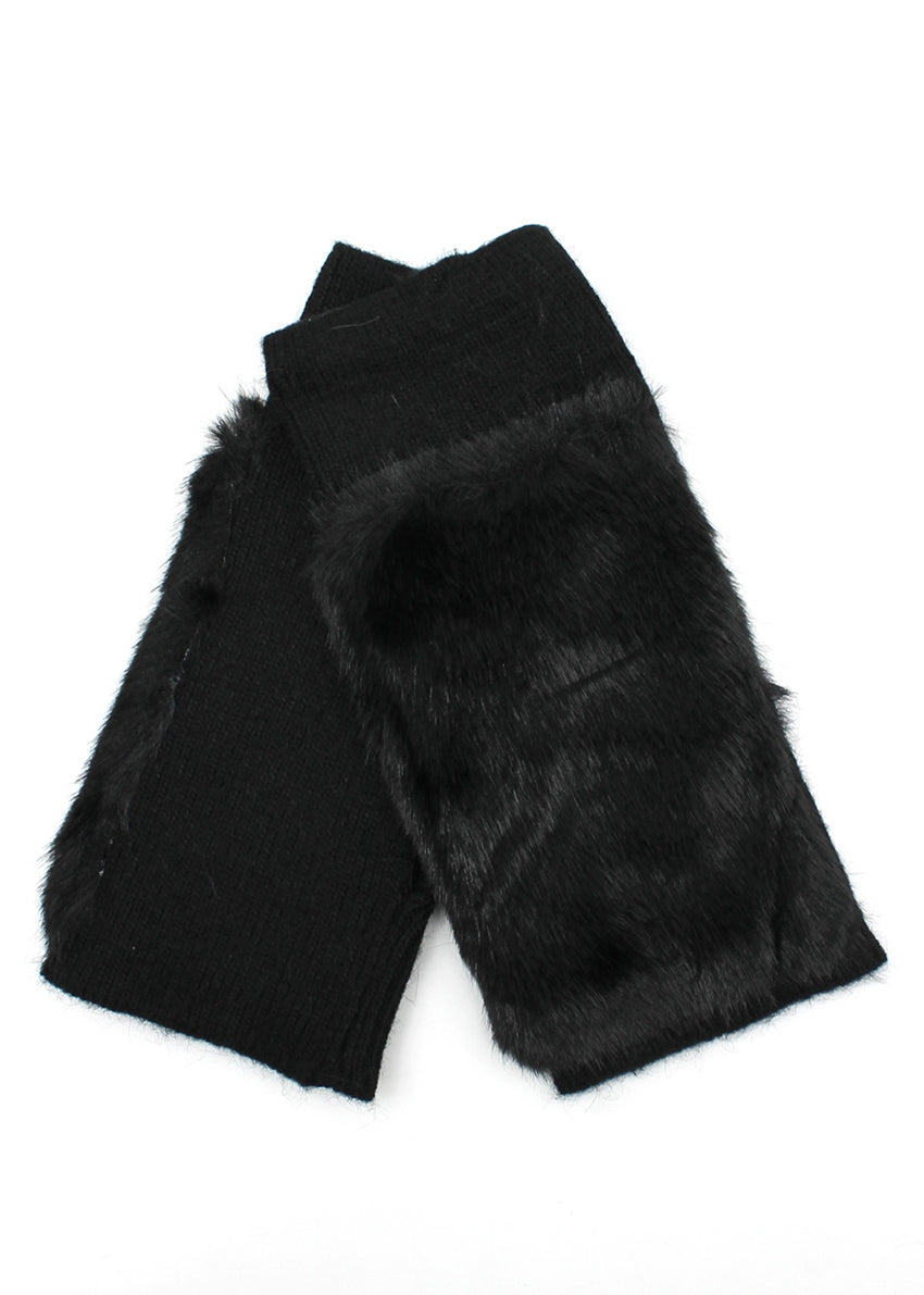 Black fur wrist warmers on a white background
