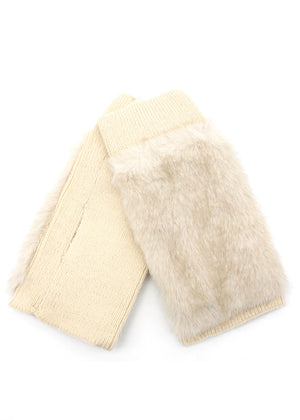 Cream-colored gloves with fur trim on a white background