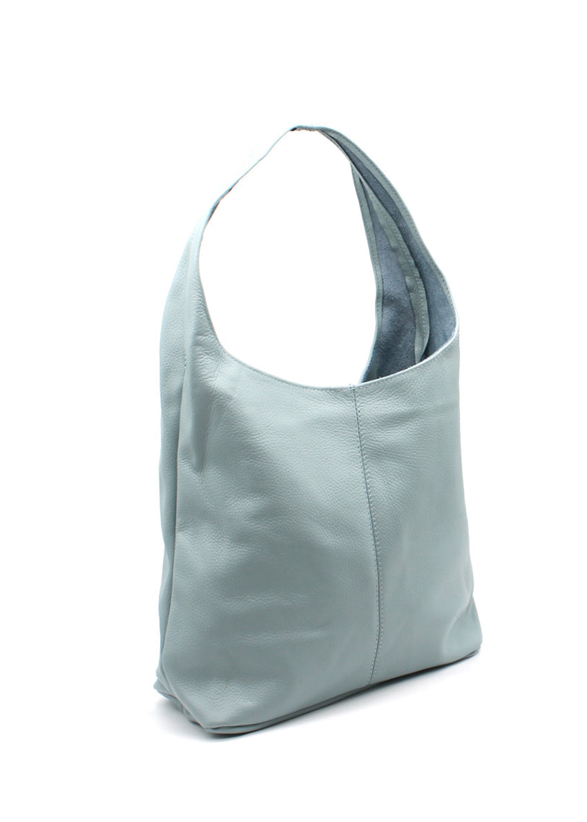 A light blue leather handbag with a minimalist design and a shoulder strap.