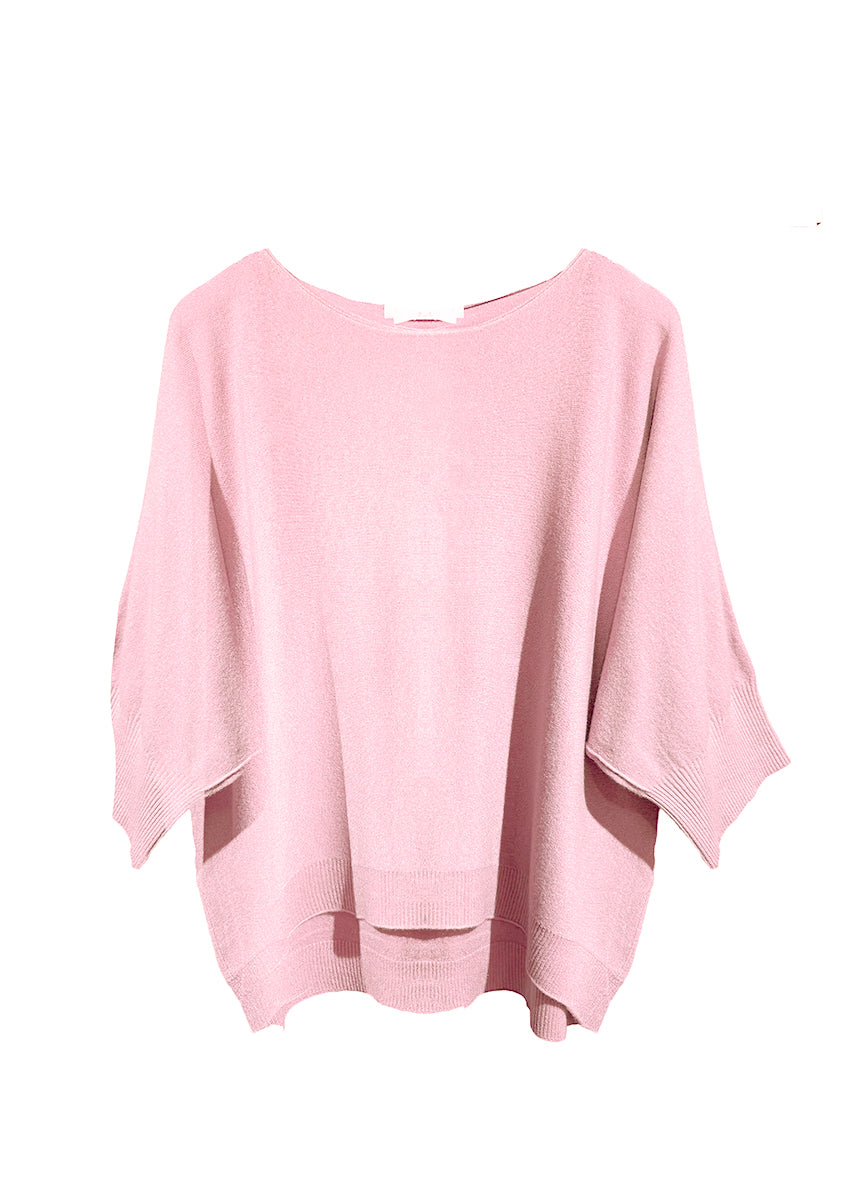 Pink sweater on a white background