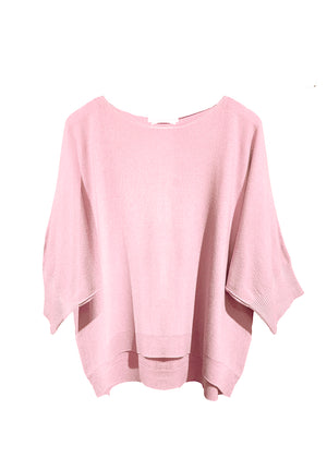 Pink sweater on a white background