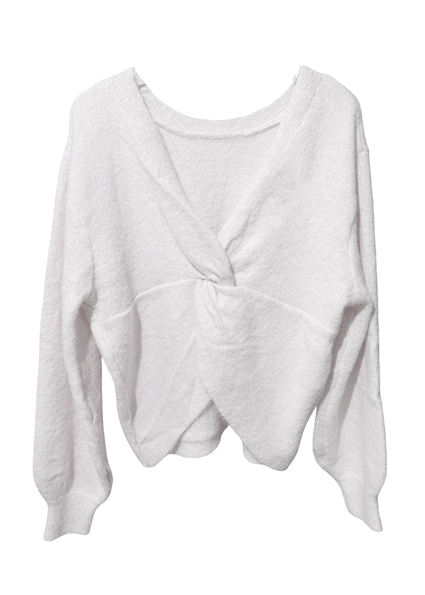 Light gray sweater with a knot detail on a white background