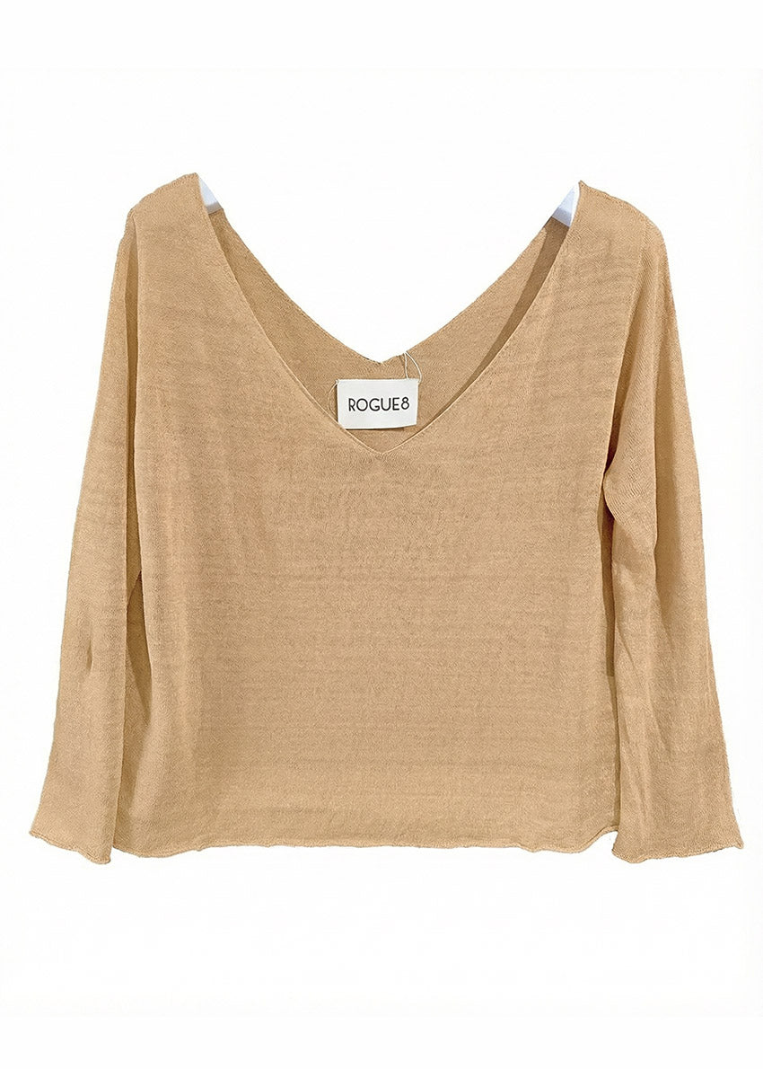 Beige long-sleeve top with 'Rogue' label on a white background