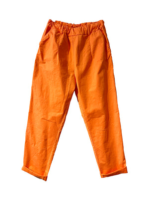 A pair of orange crepe elasticated cotton trousers with an adjustable waistband and belt loops.