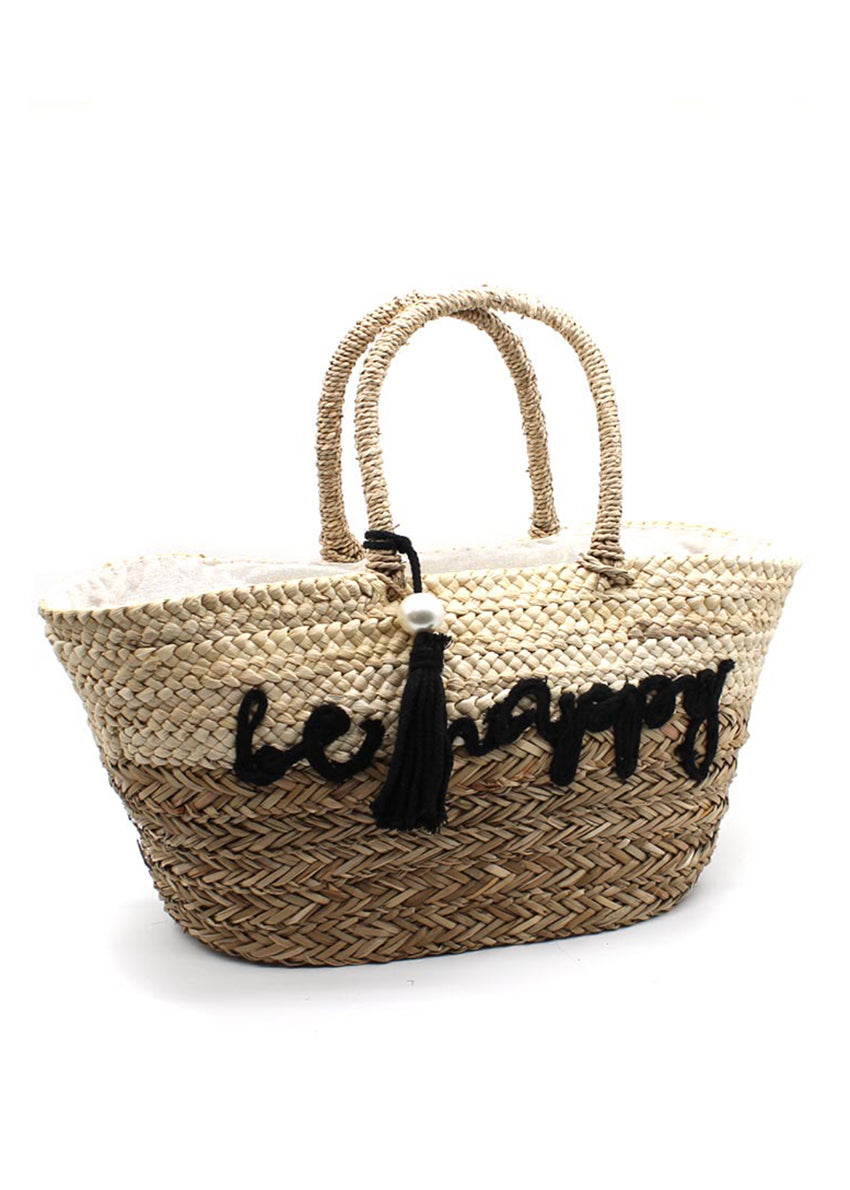 Brighten your day with the Happy Basket Bag, a handwoven masterpiece that blends natural charm with playful vibes. Featuring the cheerful phrase "Be Happy" in bold black embroidery