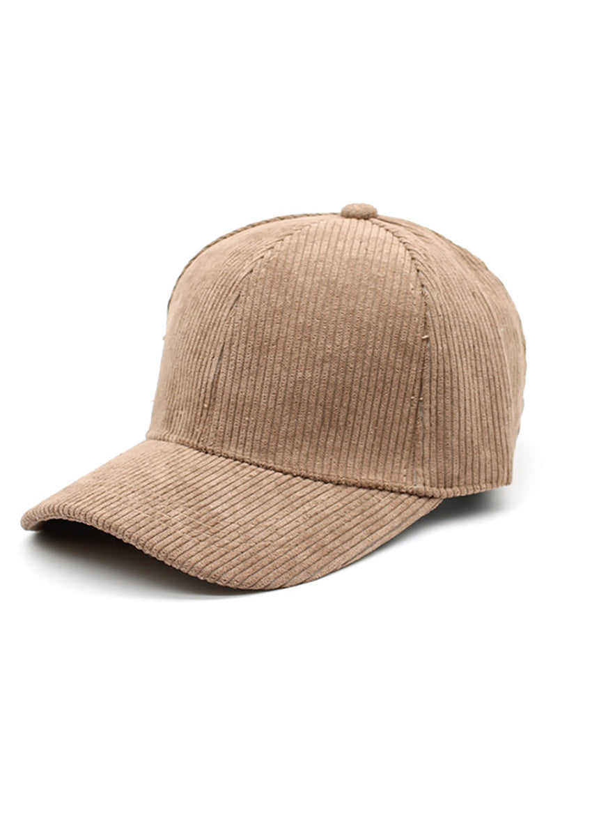 Beige corduroy cap on a white background