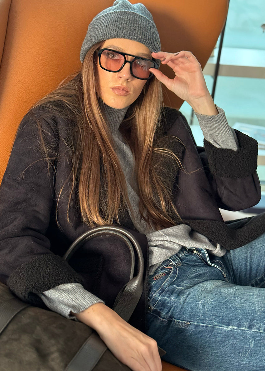 Unisex grey beanie, carefully crafted from 100% soft wool, non-scratchy and incredibly cozy.