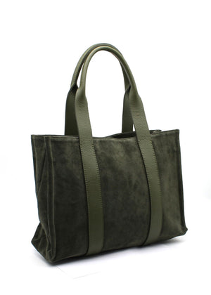 This elegant tote green bag features a minimalist design crafted from a luxurious combination of materials. The main body is made of suede, offering a soft, velvety texture, while the long, sturdy straps are made from pebbled leather