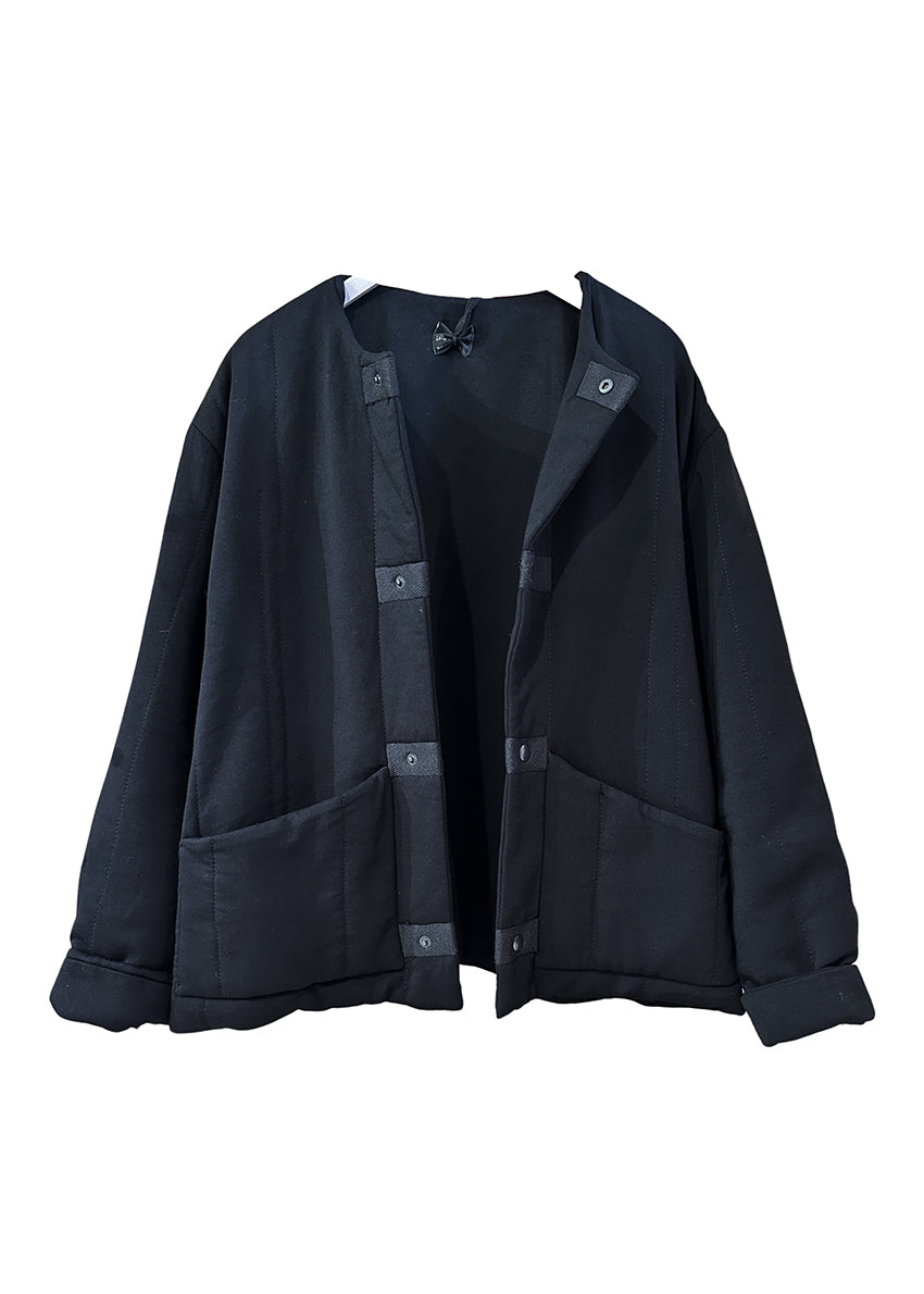 A short unisex black jacket with a front zip and two front pockets, made from soft elastic micromodal fabric.