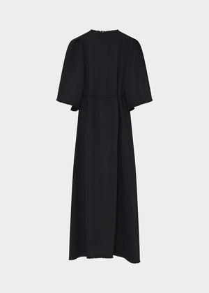 Black dress with cape sleeves on a white background
