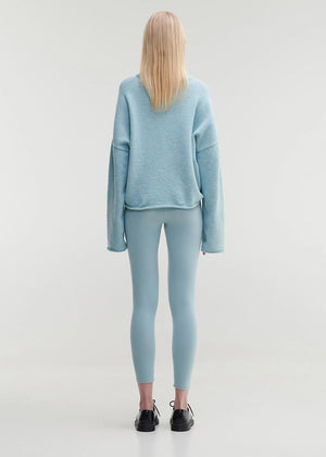 Short wide crew neck, knitted top, made of fluffy yarn.
