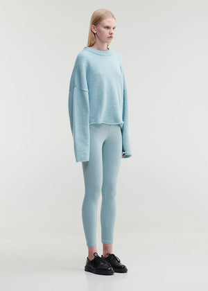 Short wide crew neck, knitted top, made of fluffy yarn.