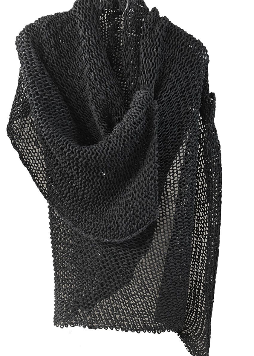 A black and blue knit vest with a relaxed fit and front opening, made of cotton and linen, displayed on a white background.