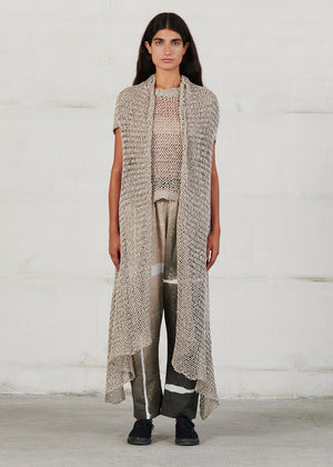 Knit that feels like a hug, sweater- vest are updated this season in chunky and ribbed styles, cropped and/or longline cuts. Linen knit, with front opening this cardigan is perfect for colder days during summer, elegant cut and soft texture.