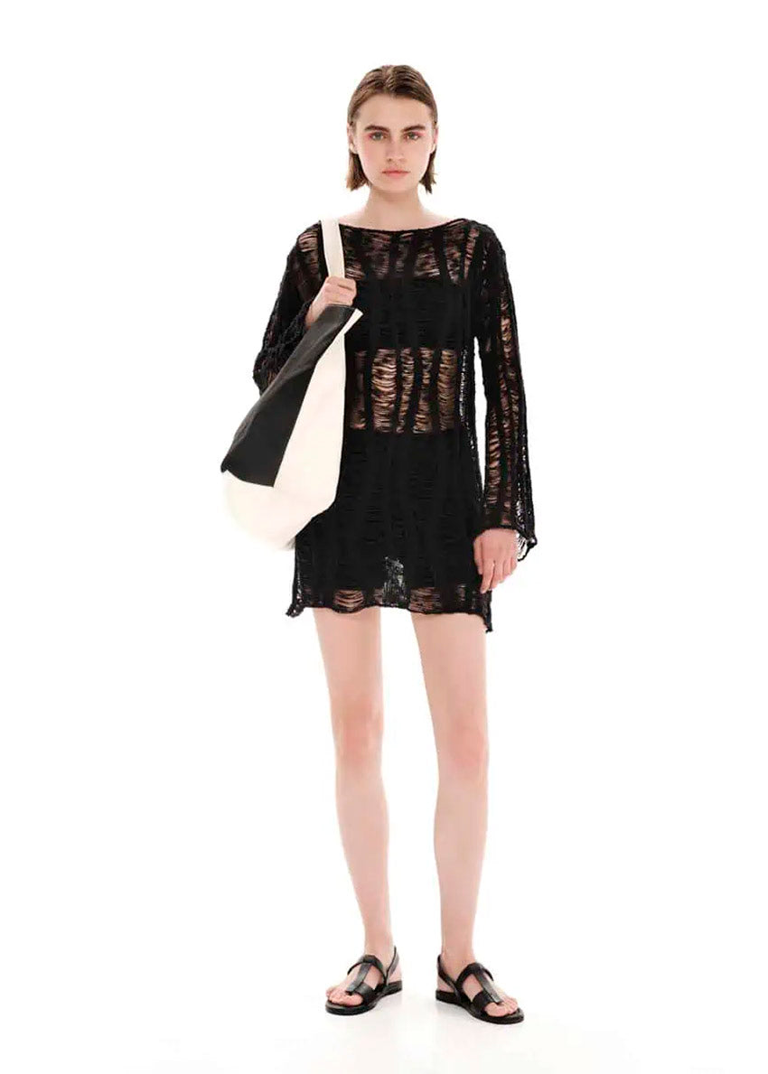 Mini transparent long sleeved black dress with perforated knitting stitch. Suitable for resort destinations