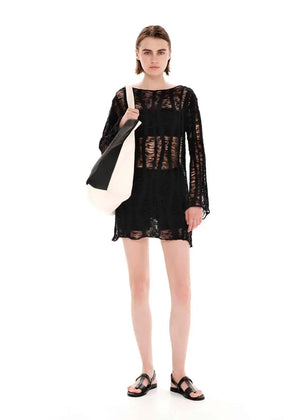 Mini transparent long sleeved black dress with perforated knitting stitch. Suitable for resort destinations