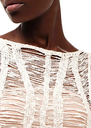 Mini transparent long sleeved white dress with perforated knitting stitch. Suitable for resort destinations